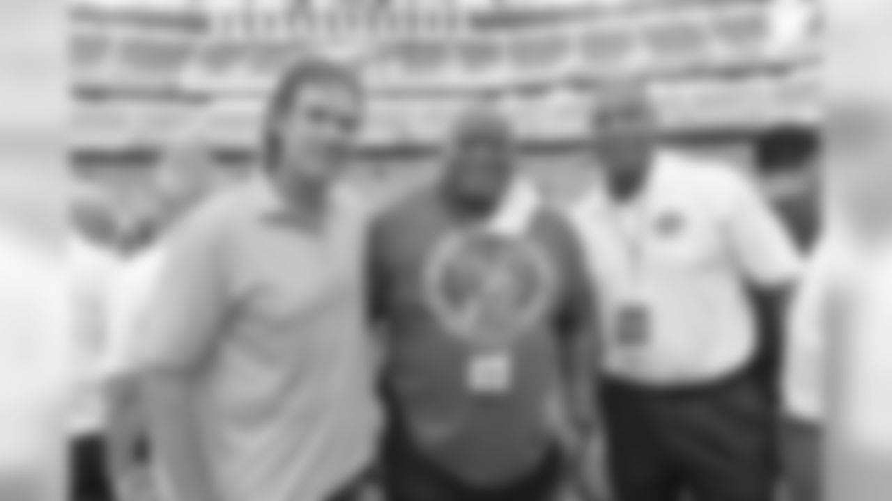 Eagles Almuni A.J. Feeley, Hollis Thomas, and William Thomas