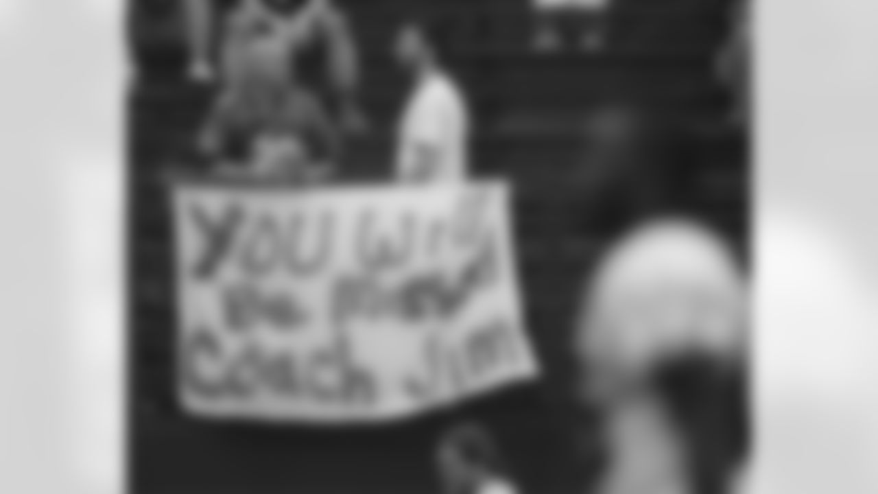 Fans offered their support with signs like this