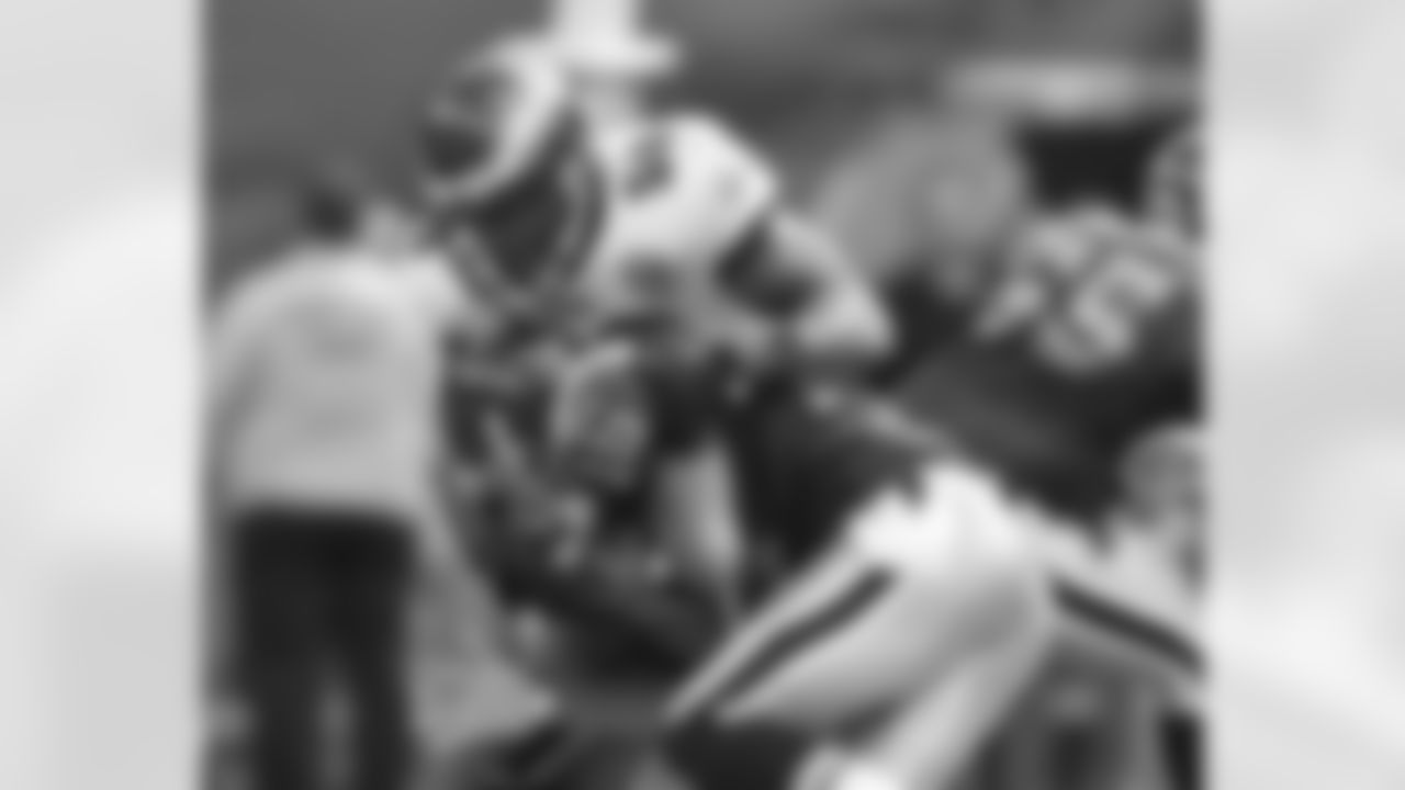 DE Trent Cole wraps up his man