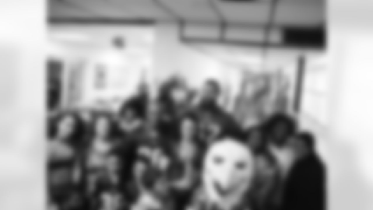 As the families gathered around for a group photo ...