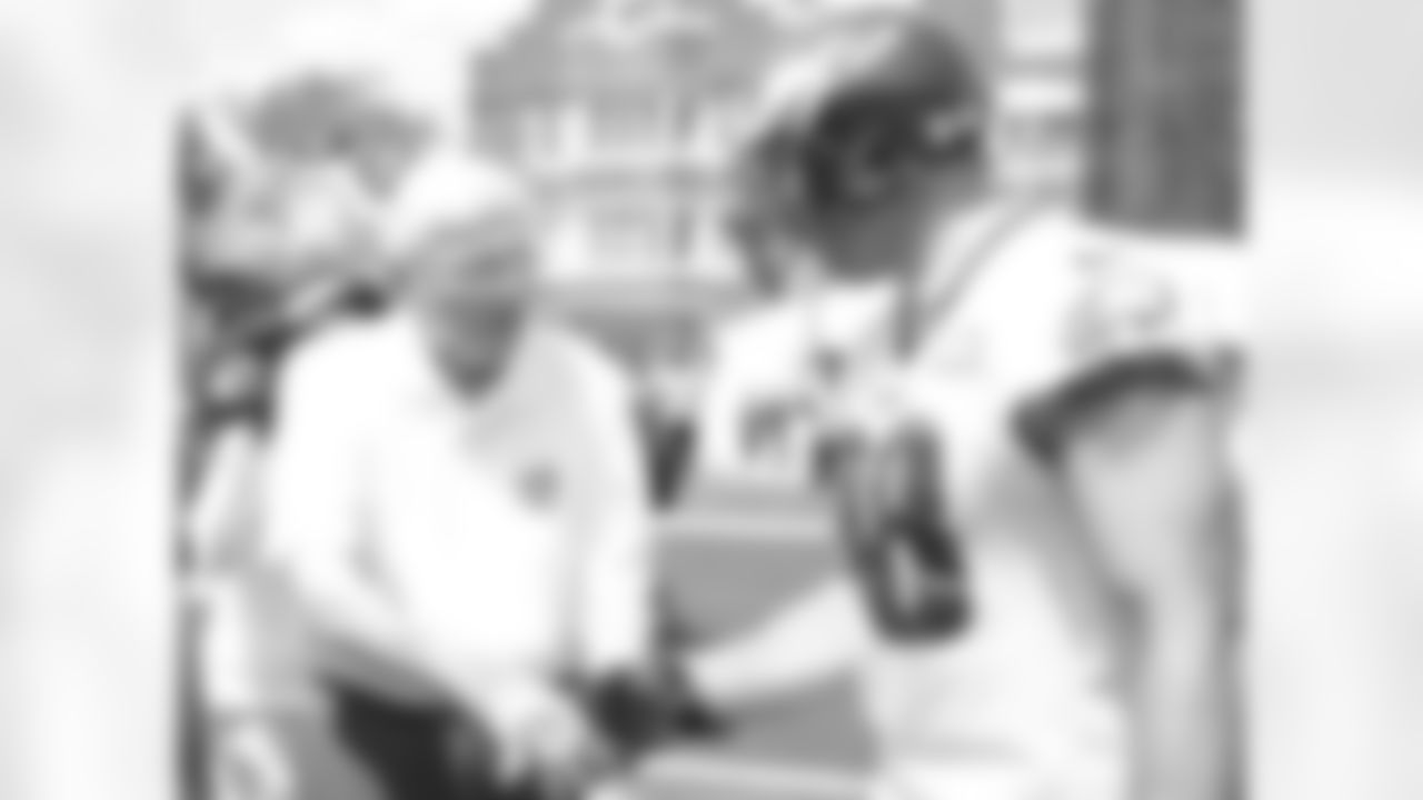 Chuck Bednarik says hello to Connor Barwin