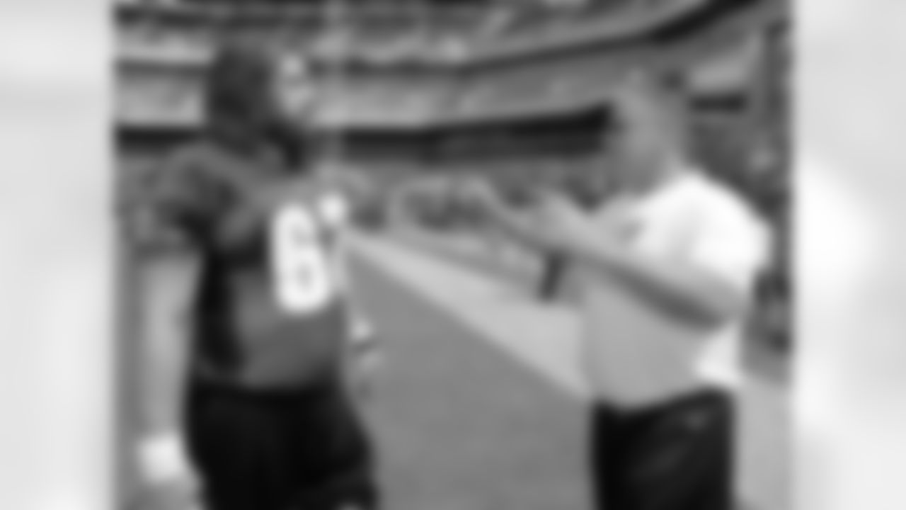 C Jason Kelce and offensive line coach Jeff Stoutland
