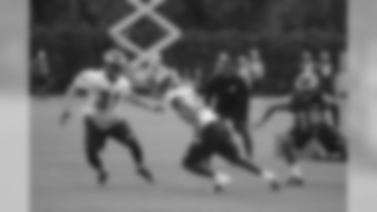 CB Byron Maxwell and WR Quron Pratt follow DB JaCorey Shepherd