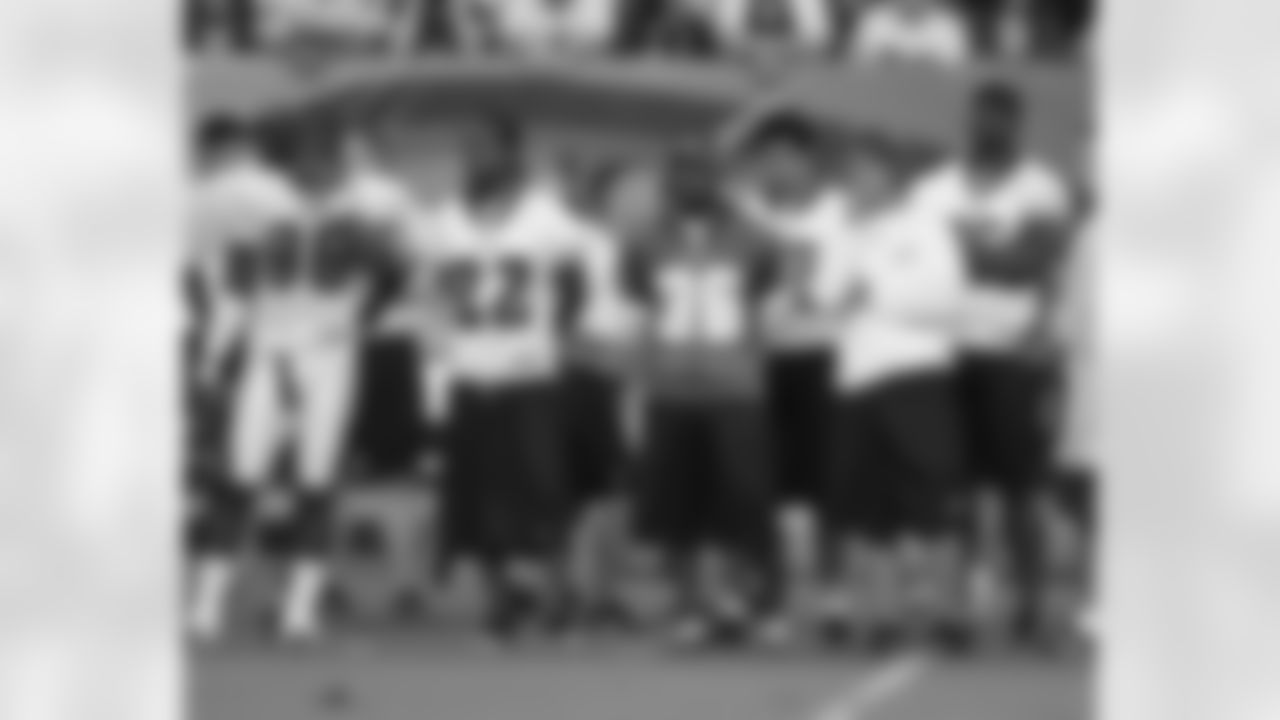 Omar Gaither, Asante Samuel, Brian Westbrook, Macho Harris, and Victor Abiamiri look on