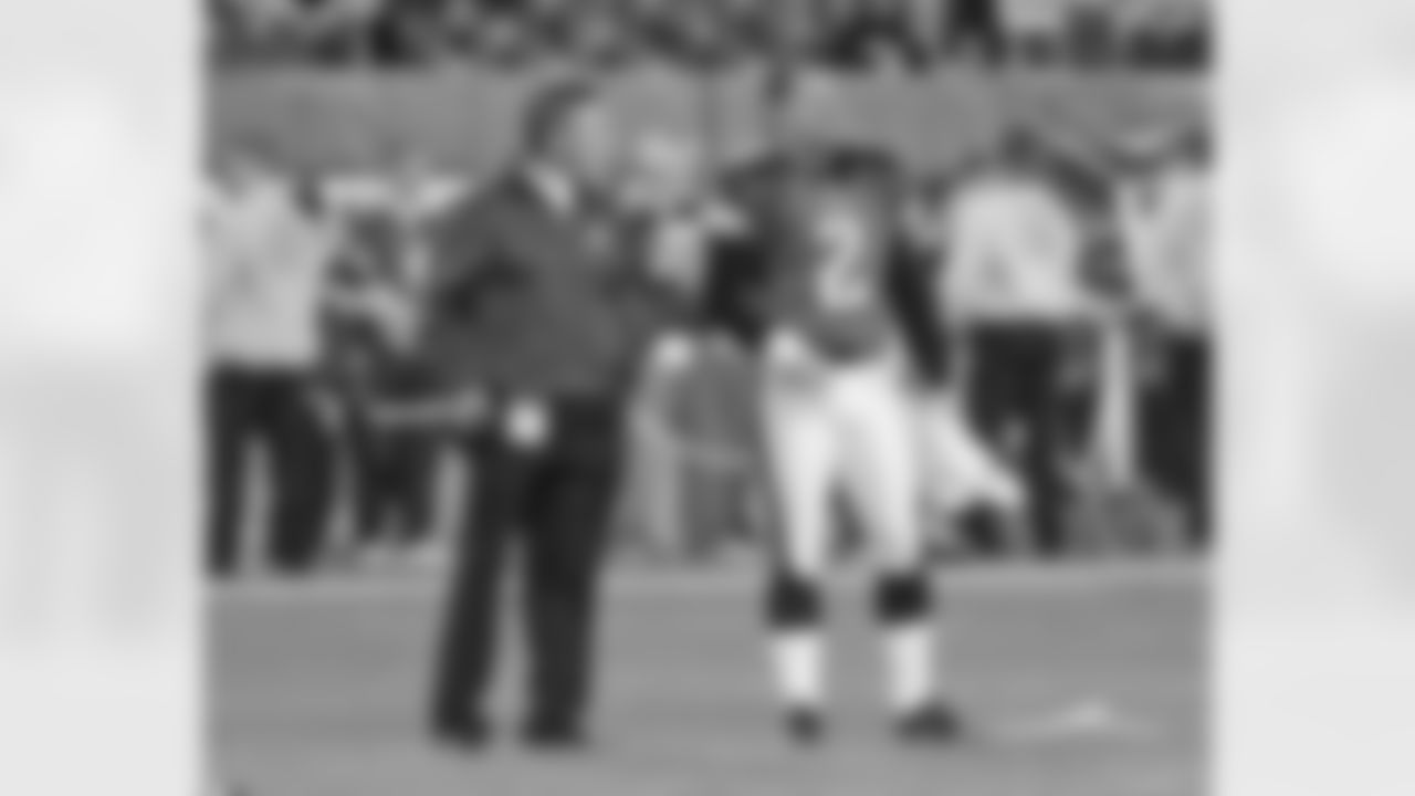 Kicking coach Randy Brown and David Akers