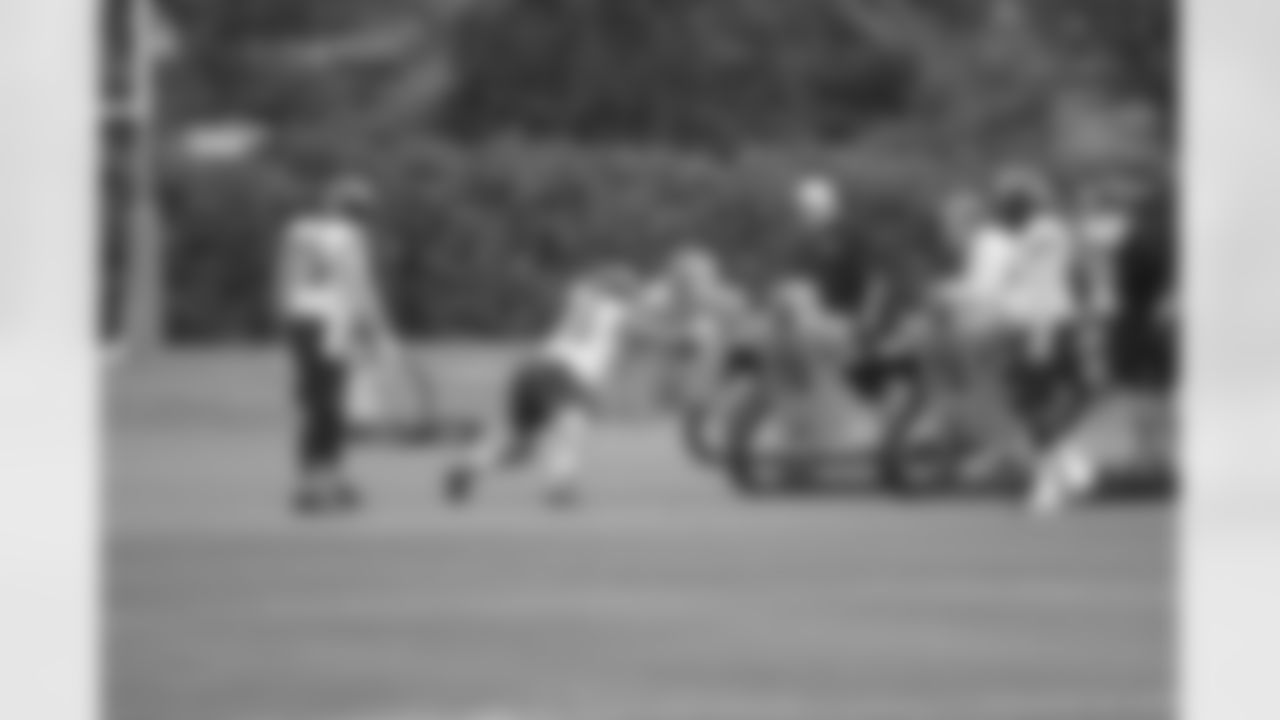 LB Bryan Braman moves the sled