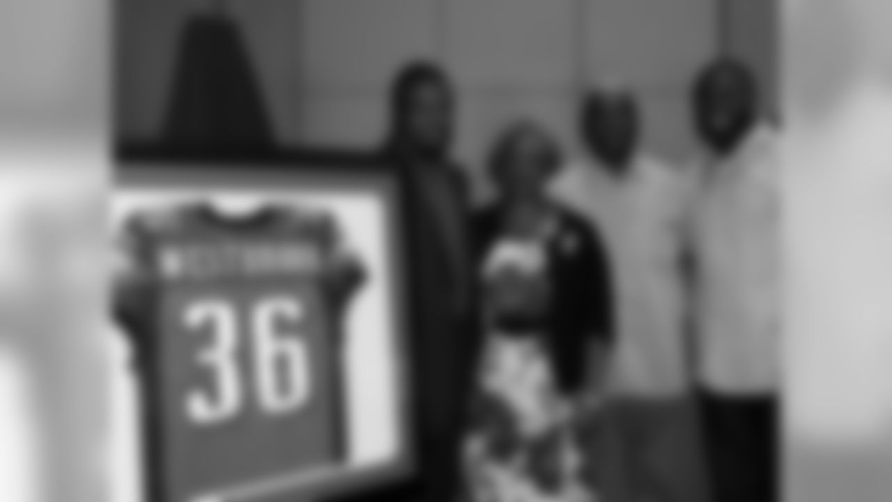 Brian Westbrook with his parents and his brother, Byron, who played for the Redskins