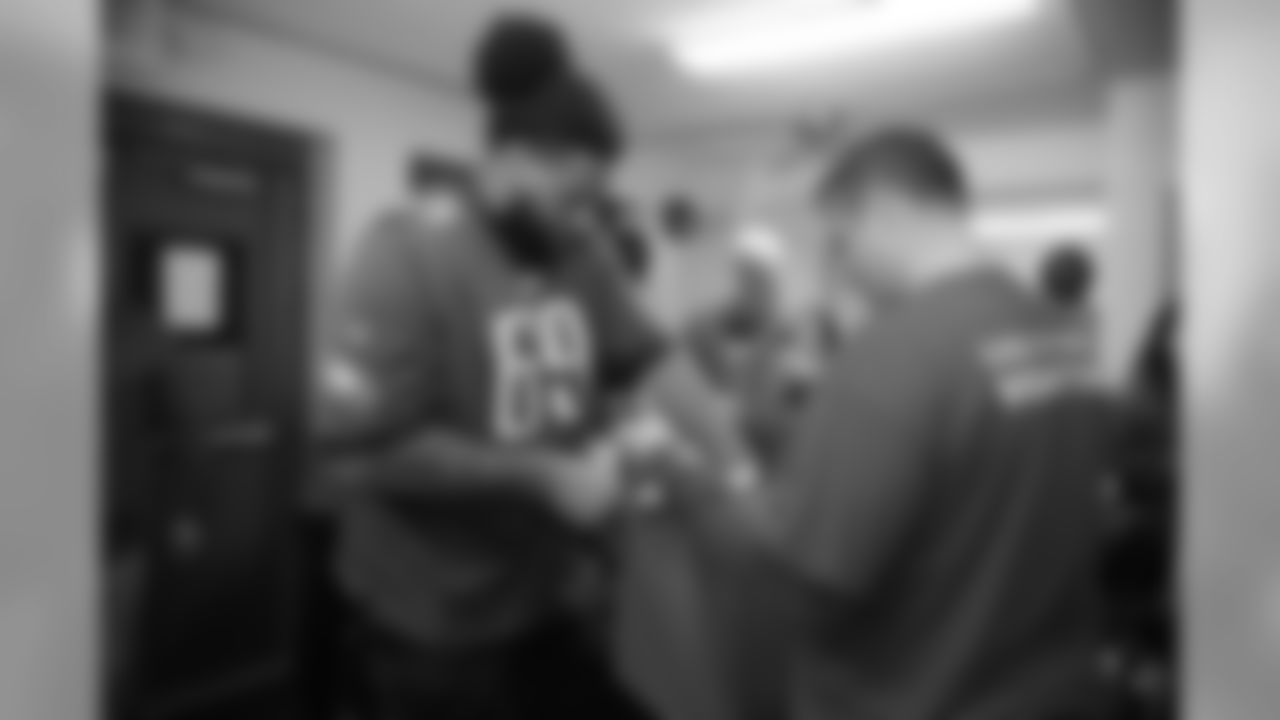 Matt Pryor filling up a bag with food items