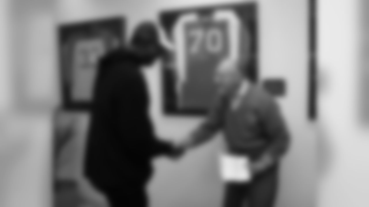 A handshake between two inductees into the Philadelphia Sports Hall of Fame - former Eagles WR Harold Carmichael and OT Al Wistert