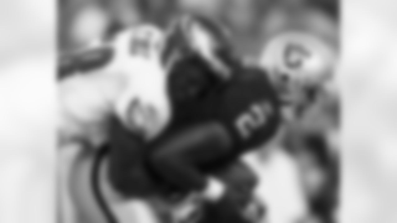 DE Trent Cole with sack of Oakland QB Aaron Brooks