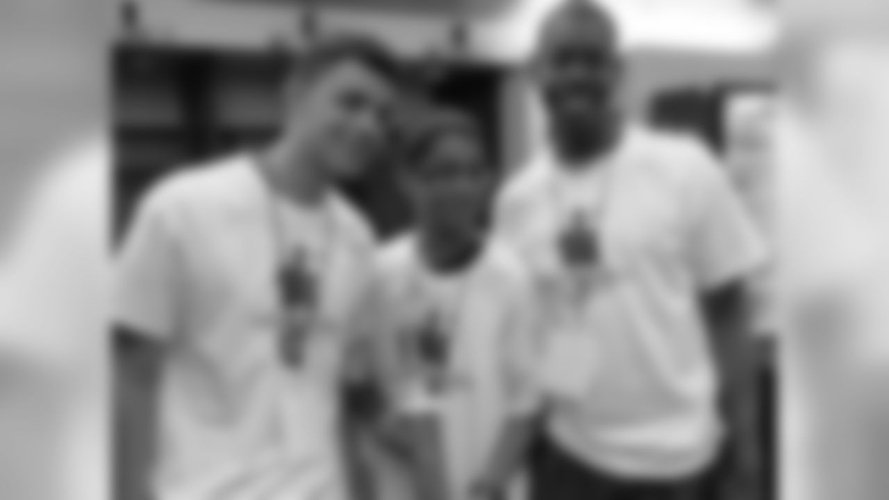 Following the tournament, winners received their trophies and medals in the Eagles' locker room at Lincoln Financial Field