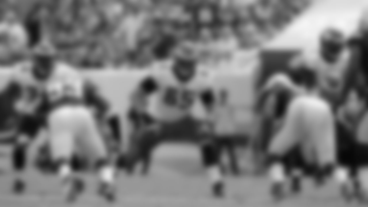 Eagles' rookie offensive tackle Lane Johnson (65) tries to get in position to protect the quarterback.