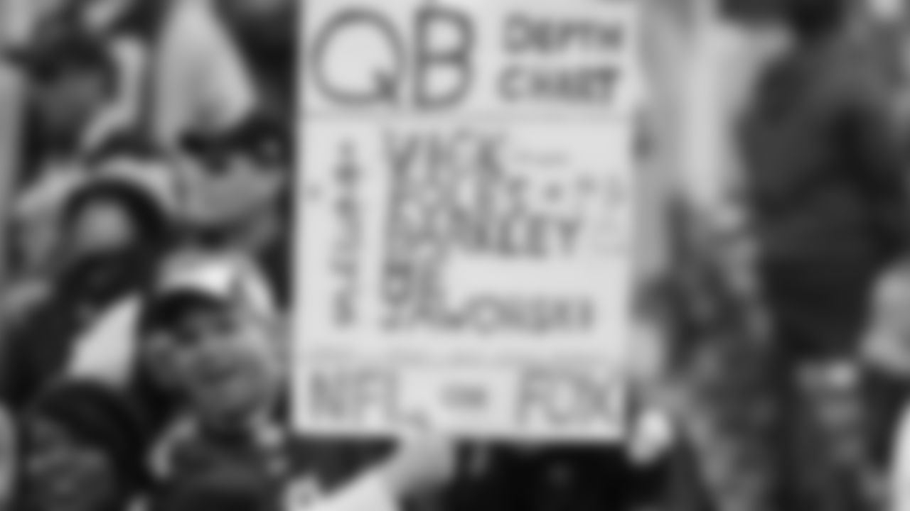 An Eagles fan in Oakland holding up a sign in support of the team.