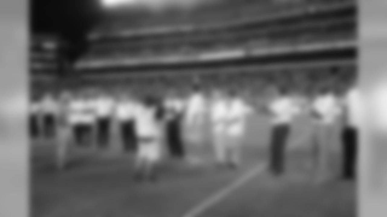 Members of the Eagles Legends Community being honored at Halftime