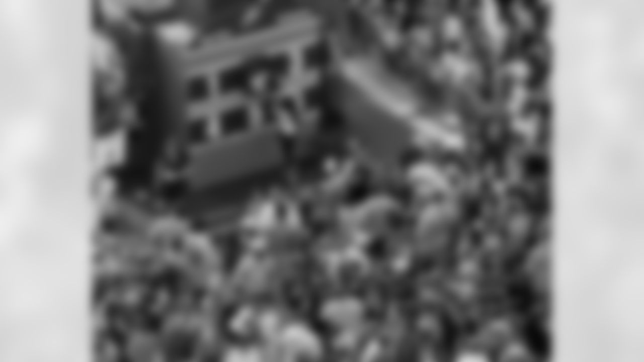 Fans gather around one of the fun games at the HeadHouse plaza