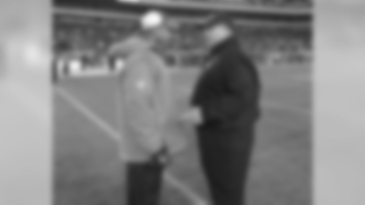 Head Coach Andy Reid with Minnesota's Leslie Frazier