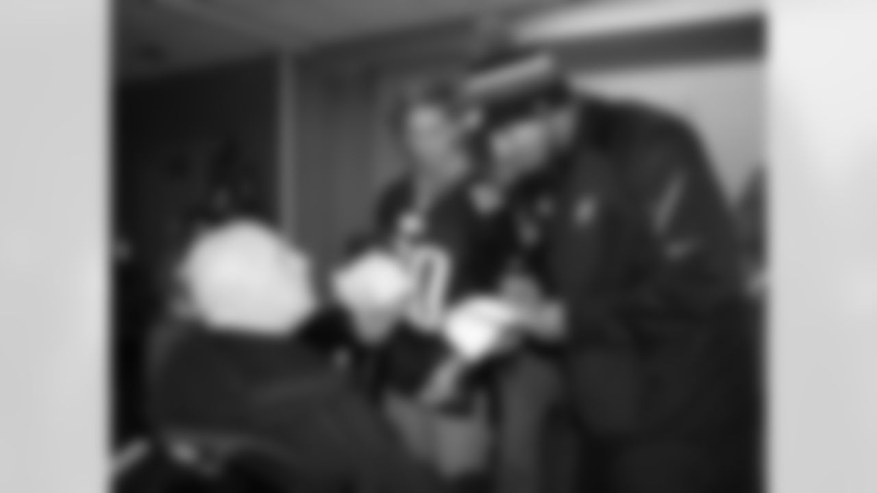 LB Najee Goode signed autographs for the patients