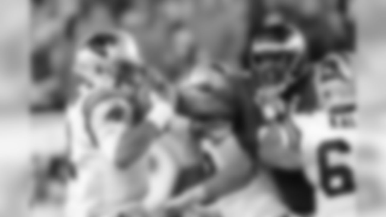 DE Fletcher Cox reaching in and disturbing the Panthers' QB