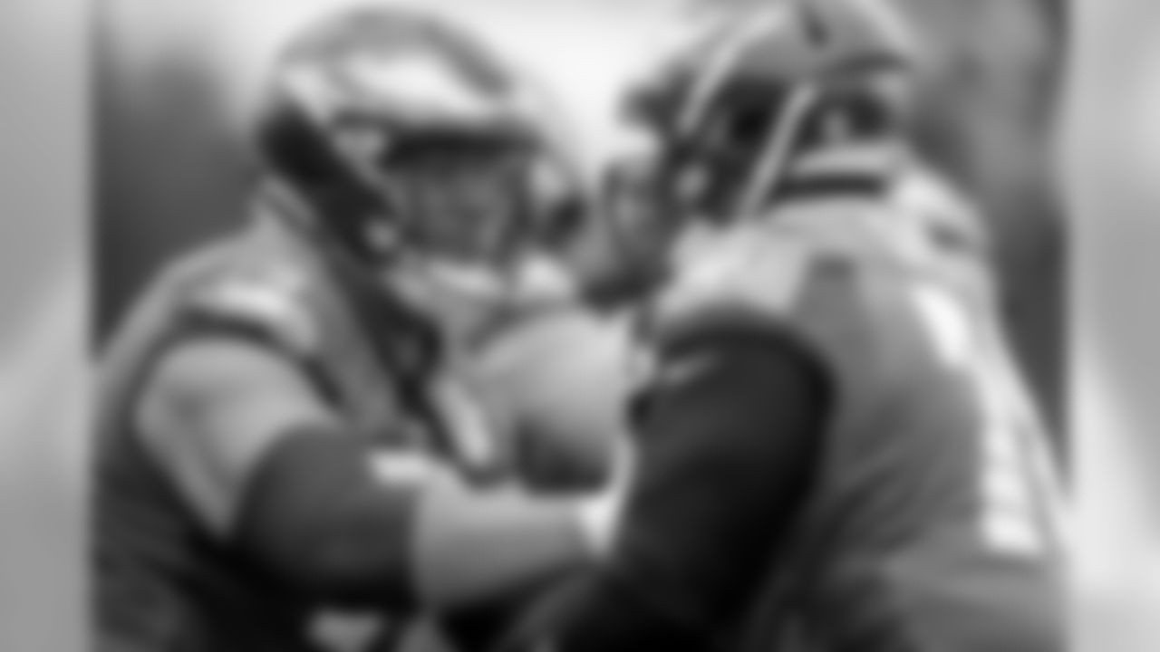 T Halapoulivaati Vaitai and G Darrell Greene