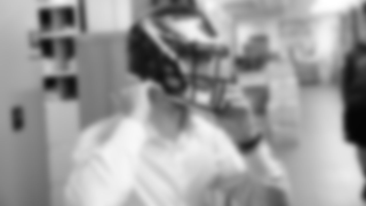 Carson Wentz tries on an Eagles helmet for the first time