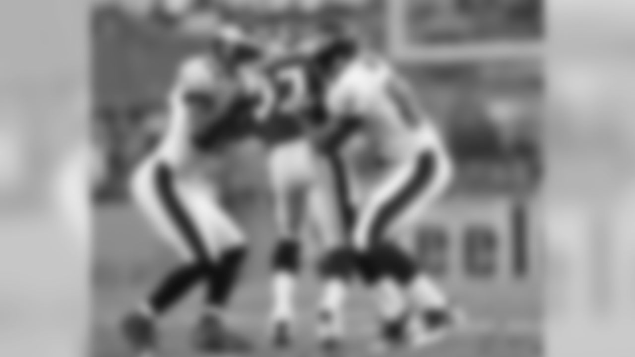 CB Nick Graham and WR Jason Avant do their work as 'gunners' on special teams