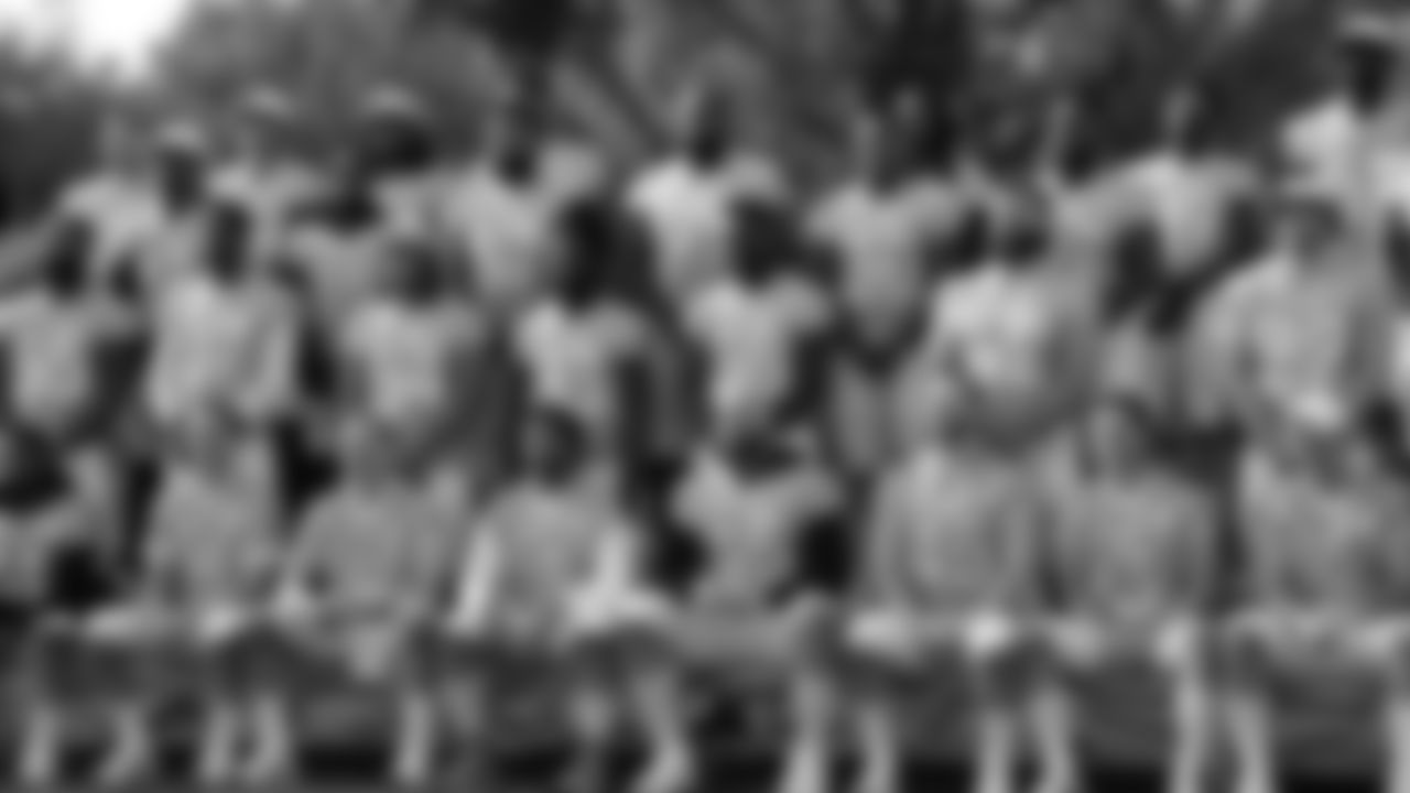 The NFC team poses during team pictures