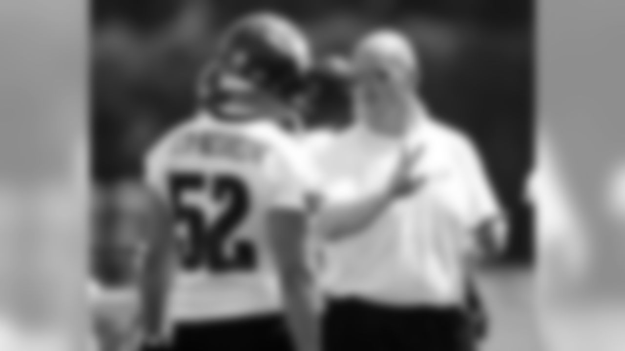DE Daniel Te'o-Nesheim with defensive line coach Rory Segrest