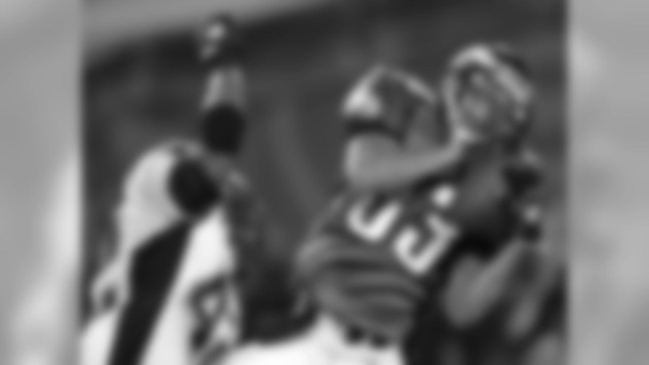 Wide receiver Greg Lewis hauls in one of his four catches on the day.