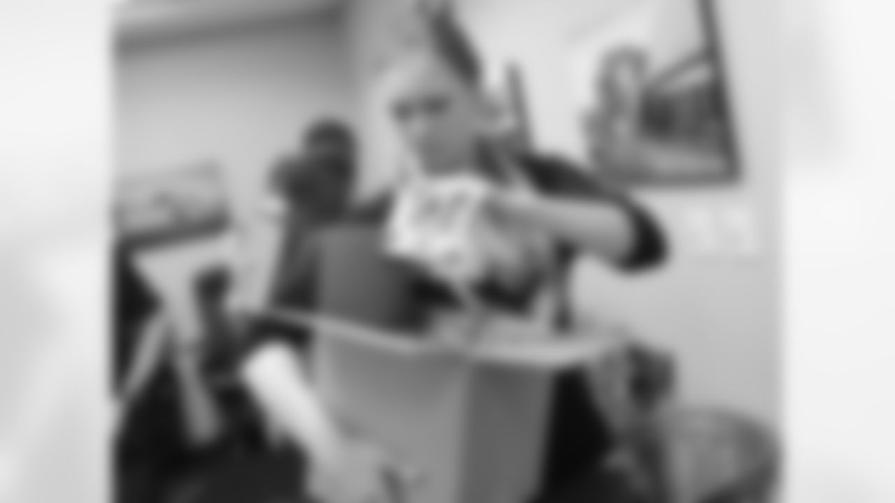 In all, Eagles employees stuffed 100 baskets