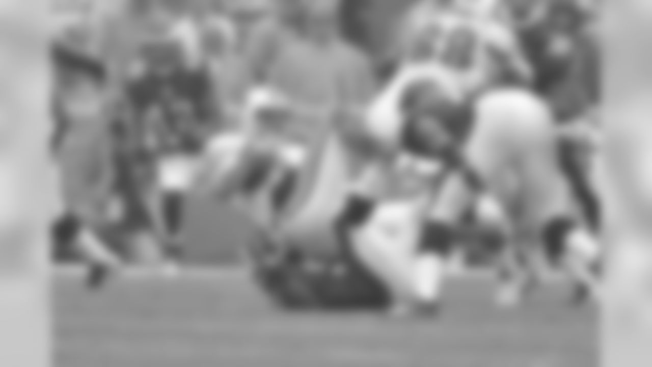 LB Brian Rolle sacks Miami's QB