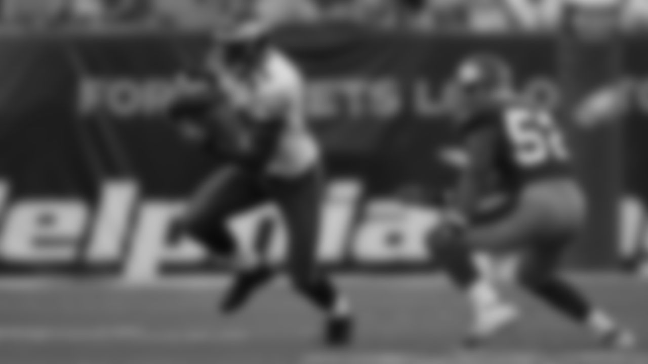 Terrell Owens scores three touchdowns in Eagles debut.