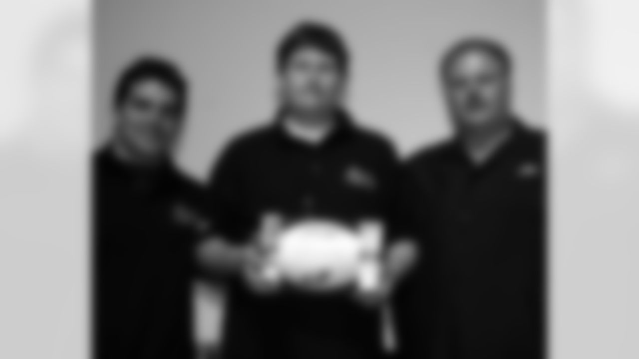 Thomas Keenan of Father Judge High School with Andy Reid and Kyle Eckel