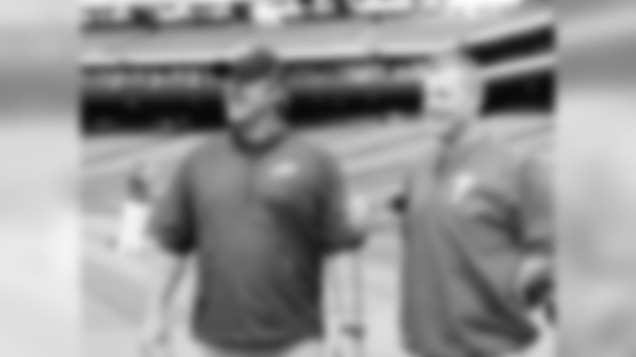 Coach Pederson and Phillies pitcher Andrew Bailey