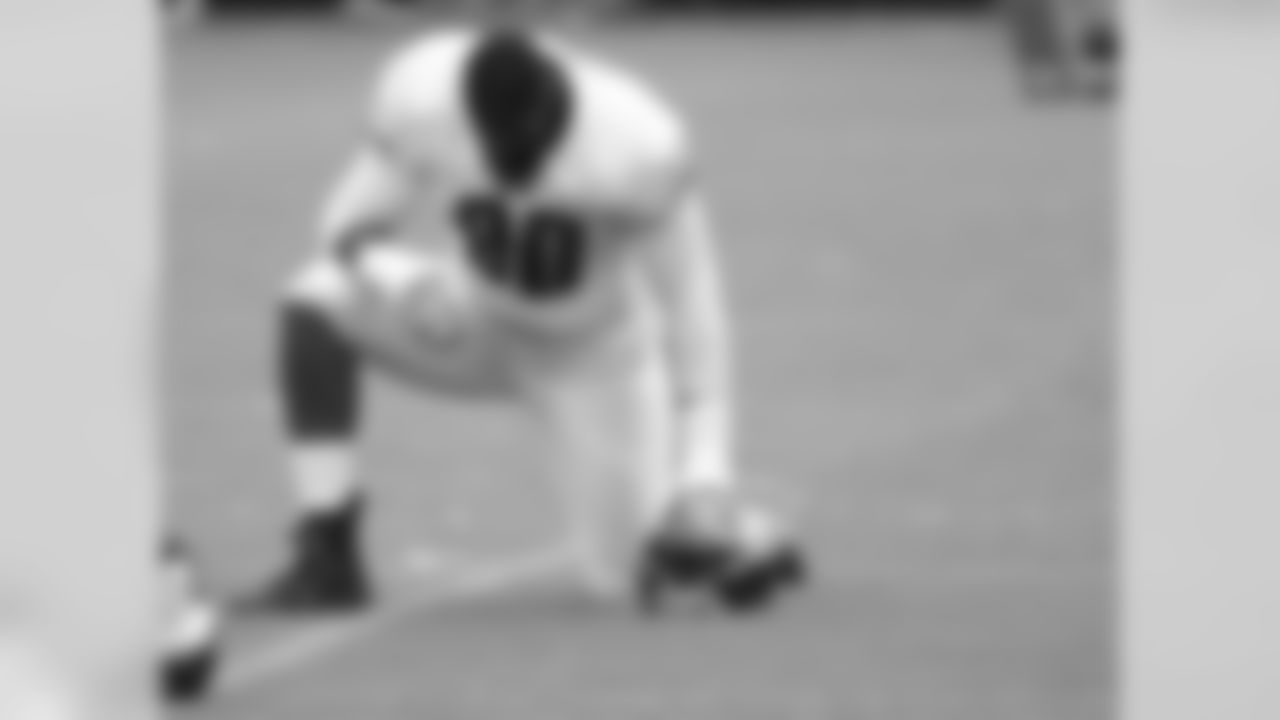 DE Clifton Geathers, the Eagles tallest player, takes some time to stretch things out