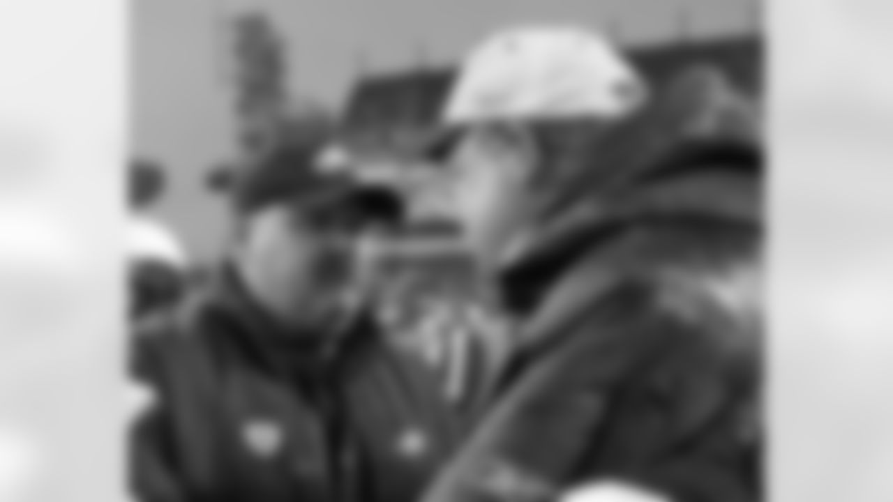 Eagles head coach Andy Reid with Seattle head coach Mike Holmgren following the game