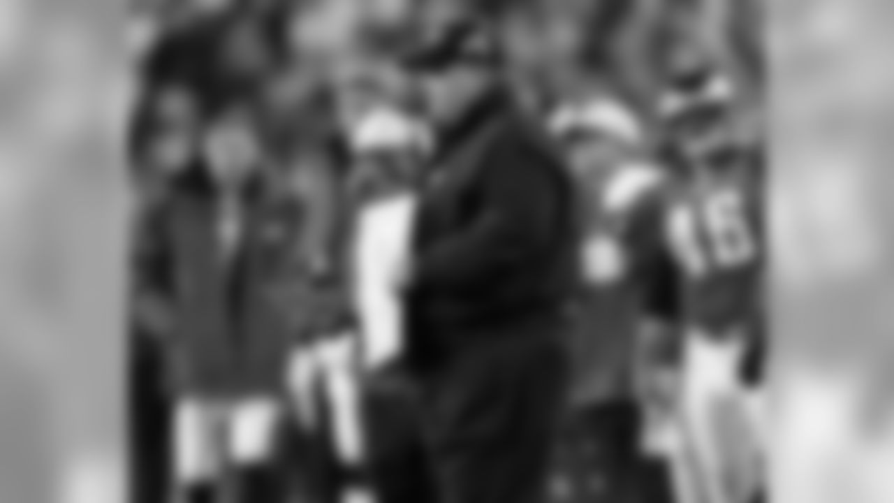 Head coach Andy Reid looks on