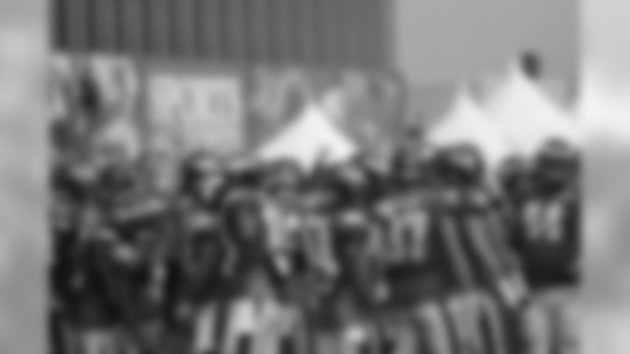 The offense huddles up