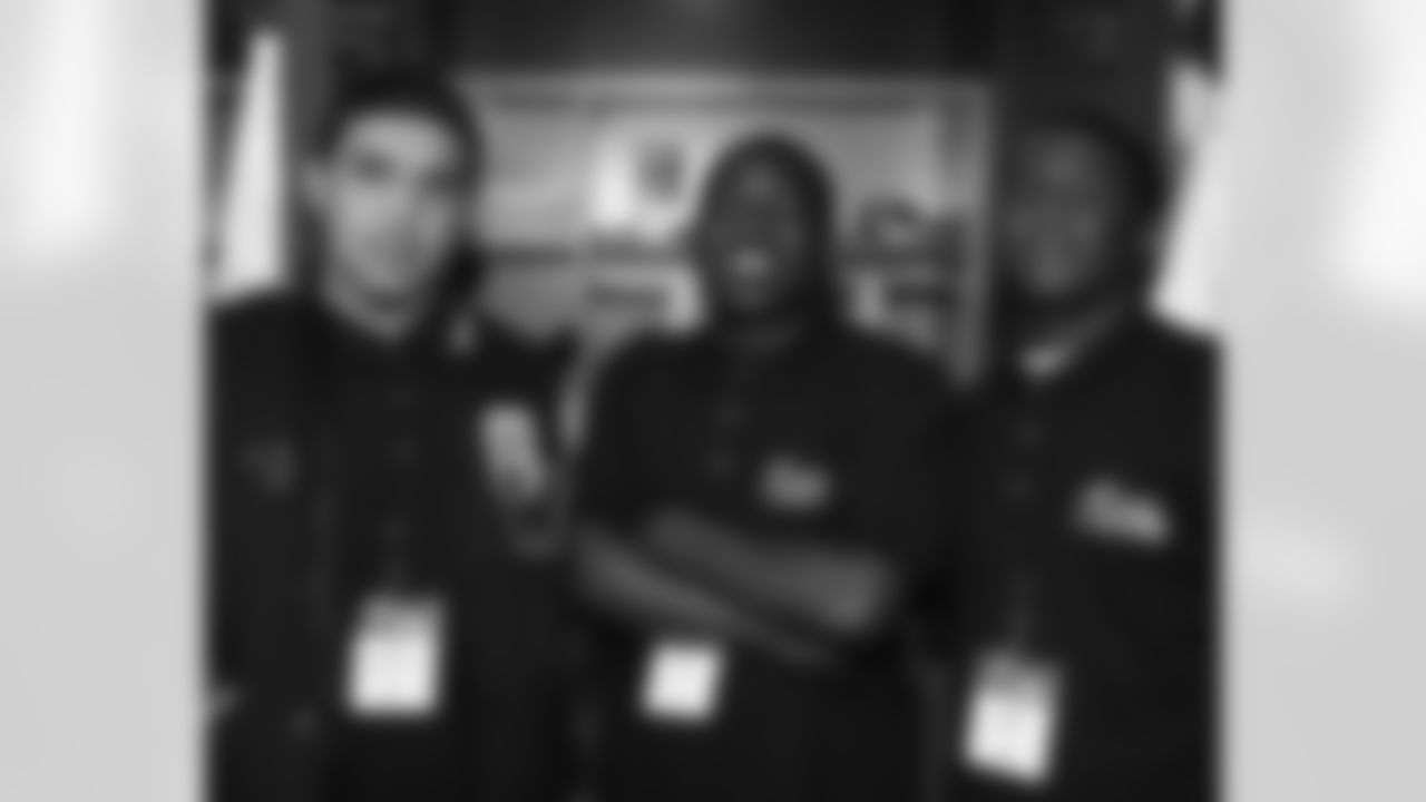 These three stand guard at CB Asante Samuel's locker