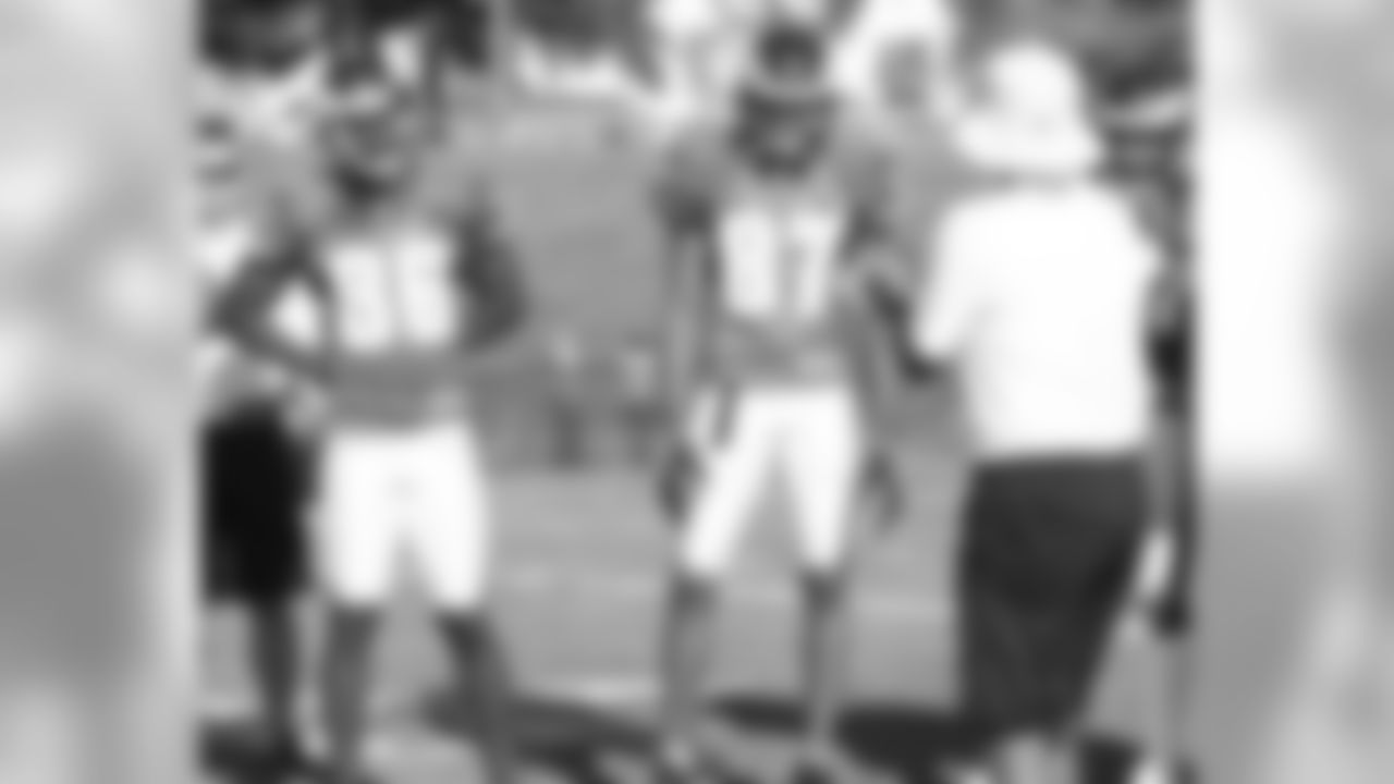 Wide receiver coach David Culley works with the receivers