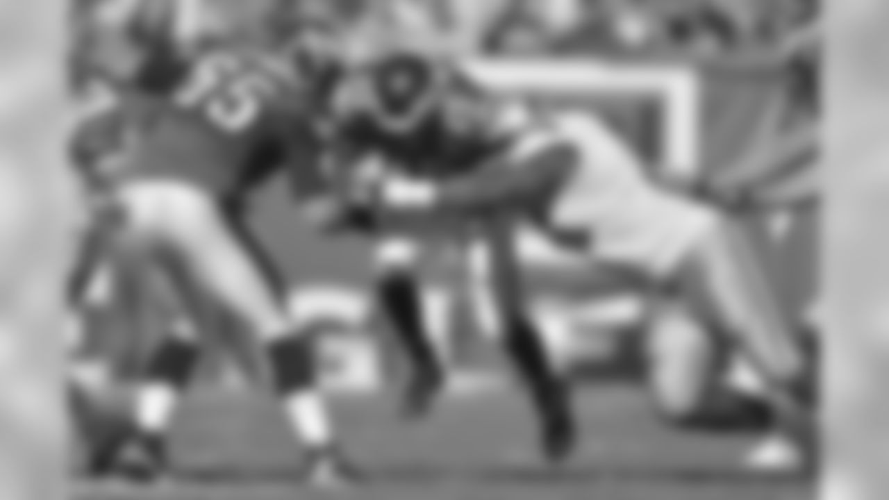 Eagles' RB LeSean McCoy gets tackled as he tries to rush for a gain.