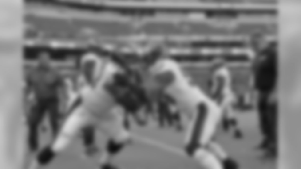 T Halapoulivaati Vaitai and DE Chris Long