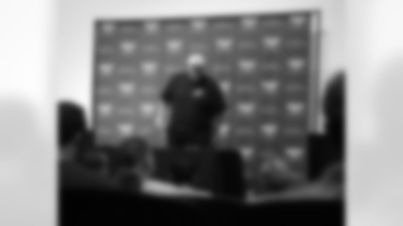 Head coach Andy Reid departs from his news conference
