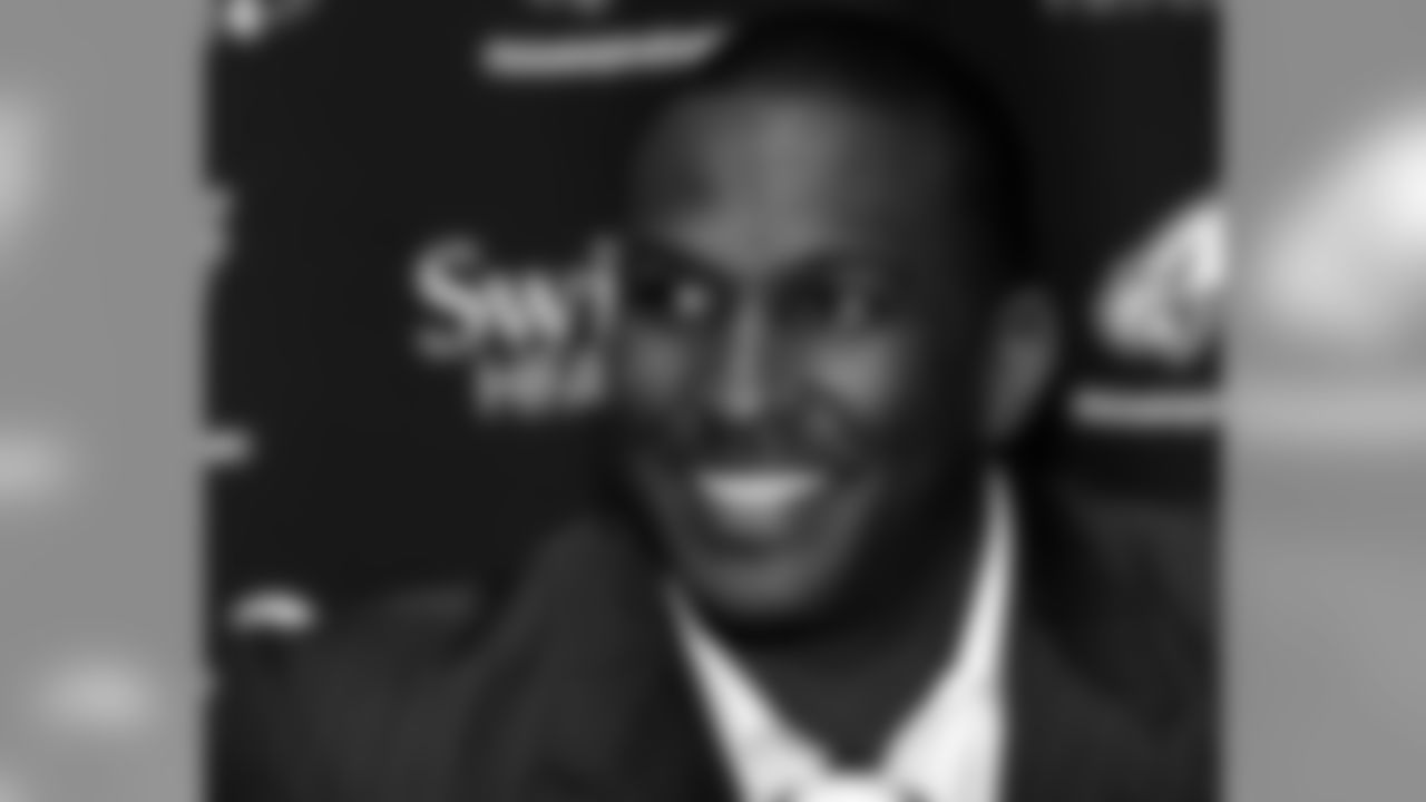 Sean Jones smiles during his introductory press conference