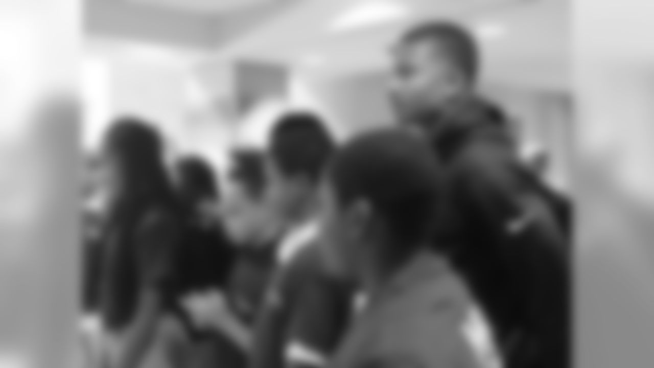 Jonathan Krause listened as the students explained more about what each robot can do