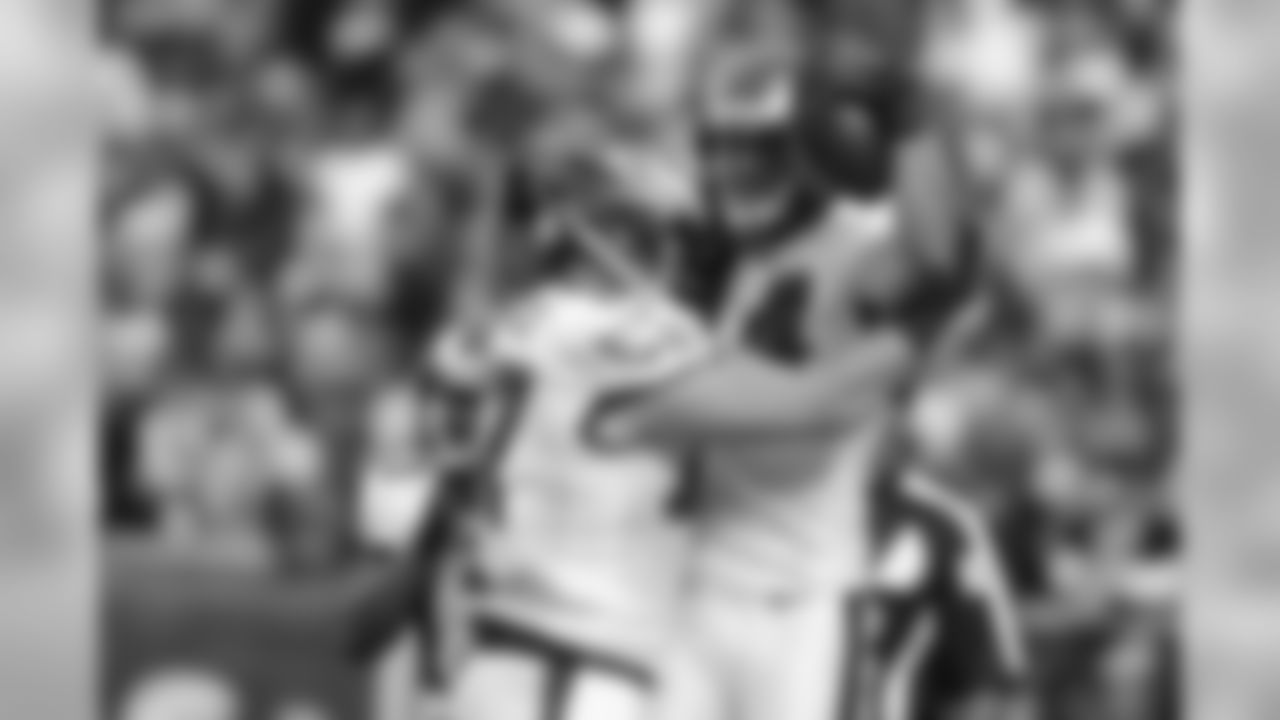 Eagles' TE Brent Celek hugs WR Riley Cooper after Cooper's touchdown.