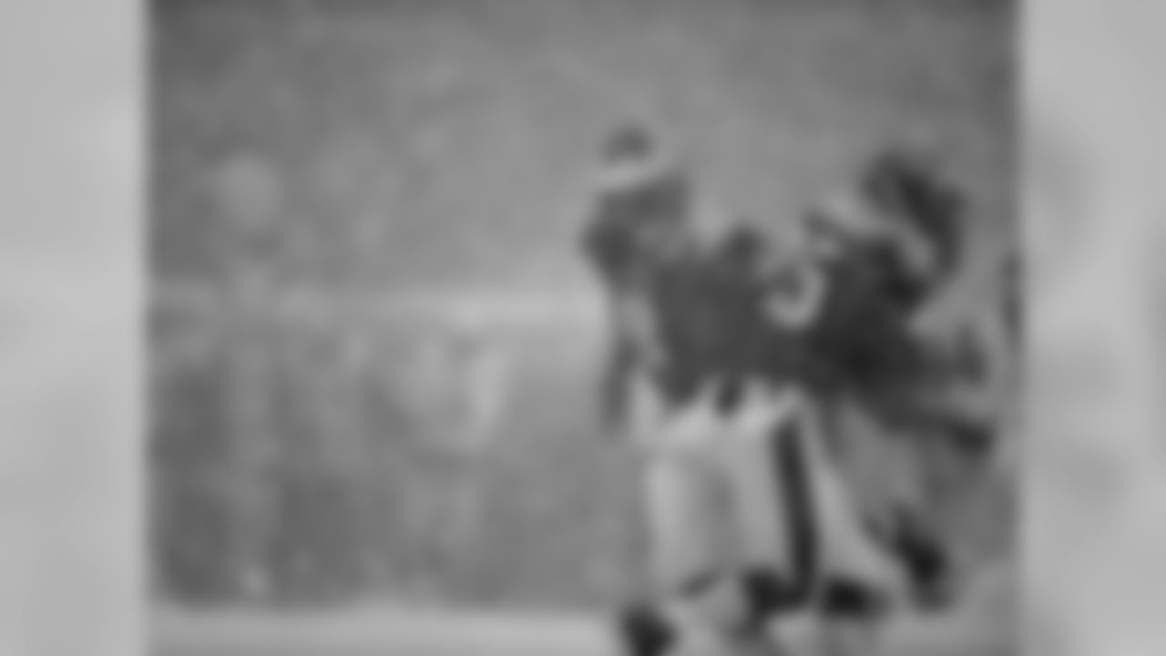 Eagles' QB Nick Foles hands the ball off to RB LeSean McCoy.