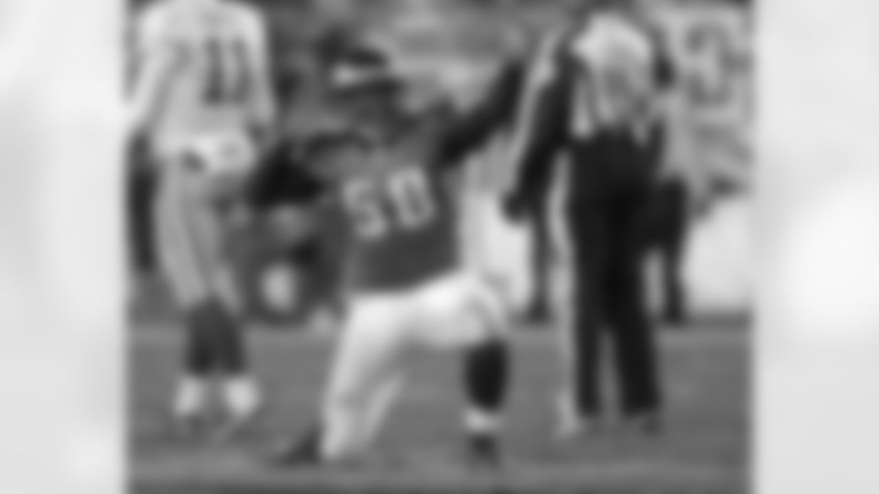 DE Trent Cole celebrates sack