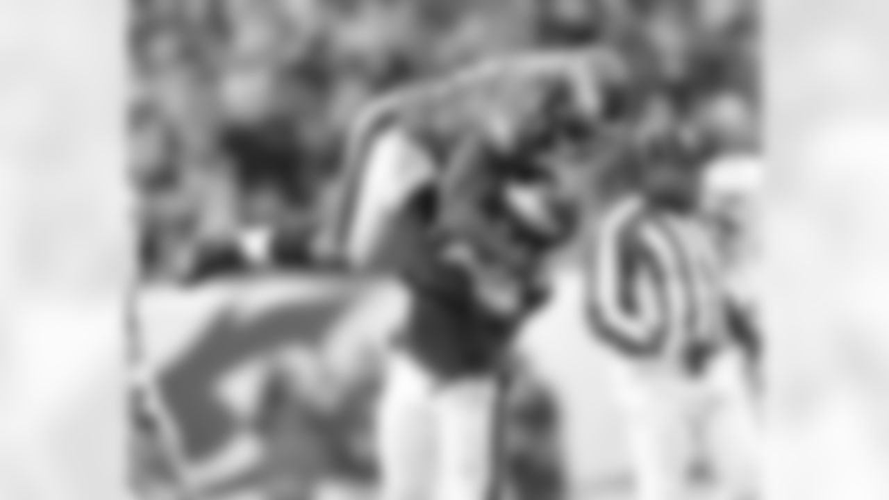 Takeo Spikes celebrates with Trent Cole following his sack on Giants QB Manning