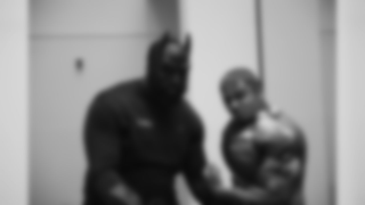 DT Bennie Logan and RB Chris Polk as Batman and the Incredible Hulk