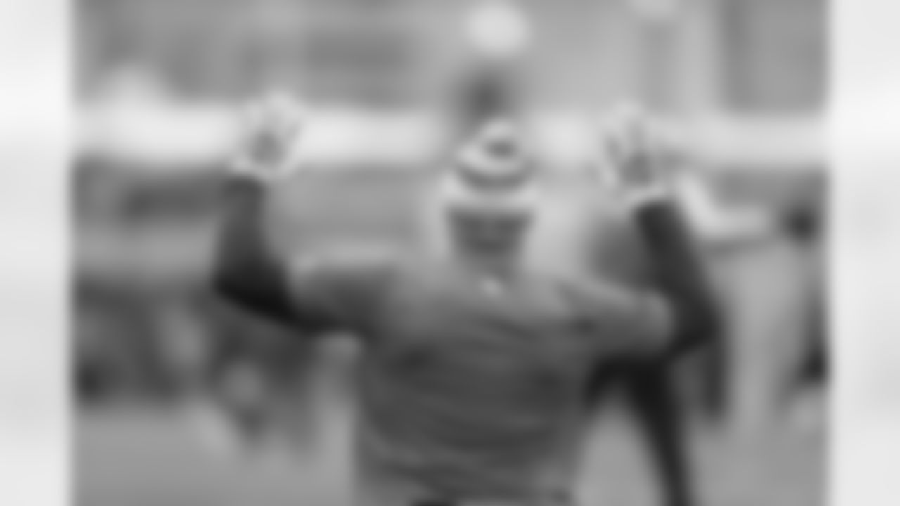 An Eagles' player in his pink playing gear